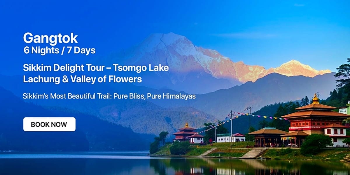 Tsomgo Lake in Sikkim with snow-capped Himalayan mountains, traditional Buddhist monastery with golden roof reflected in calm