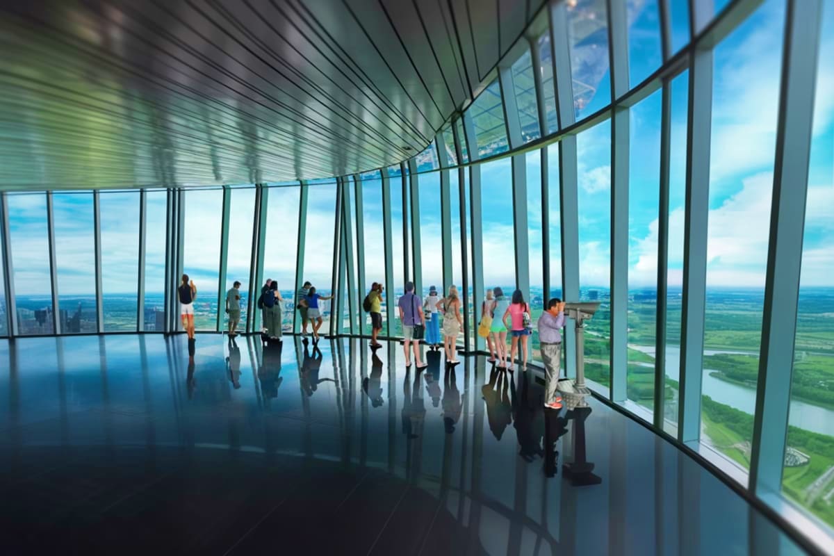 Visitors inside Saigon Skydeck observation deck with floor-to-ceiling windows overlooking Ho Chi Minh City skyline and surrou