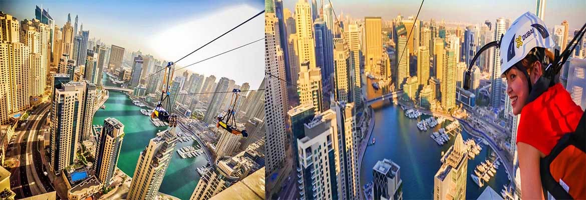 Dubai Xline Marina Person zip-lining above Dubai Marina with turquoise waterway and golden skyscrapers in background