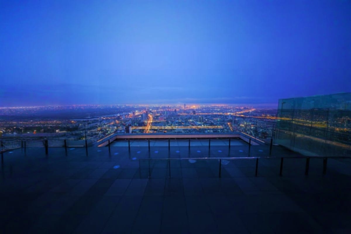 Skywalk Mahanakhon Skywalk Mahanakhon observation deck with glass floor overlooking illuminated Bangkok cityscape at twilight