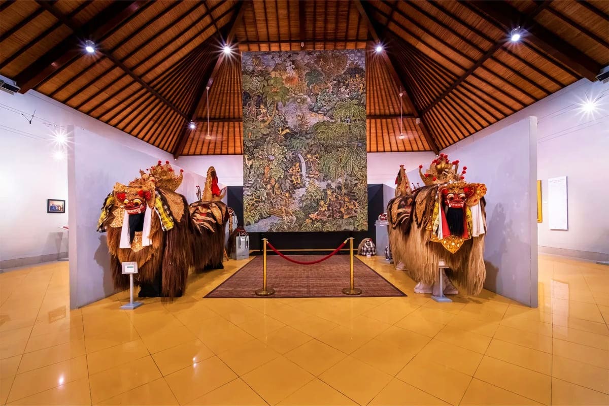 Museum Pasifika Bali Museum Pasifika Bali interior gallery with ornate decorated ceremonial elephants flanking carved stone relief centerpiece und