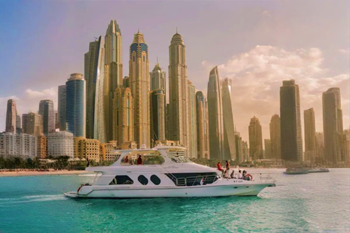 Luxury yacht moored in turquoise waters with Atlantis The Palm resort in the background, Dubai (3)