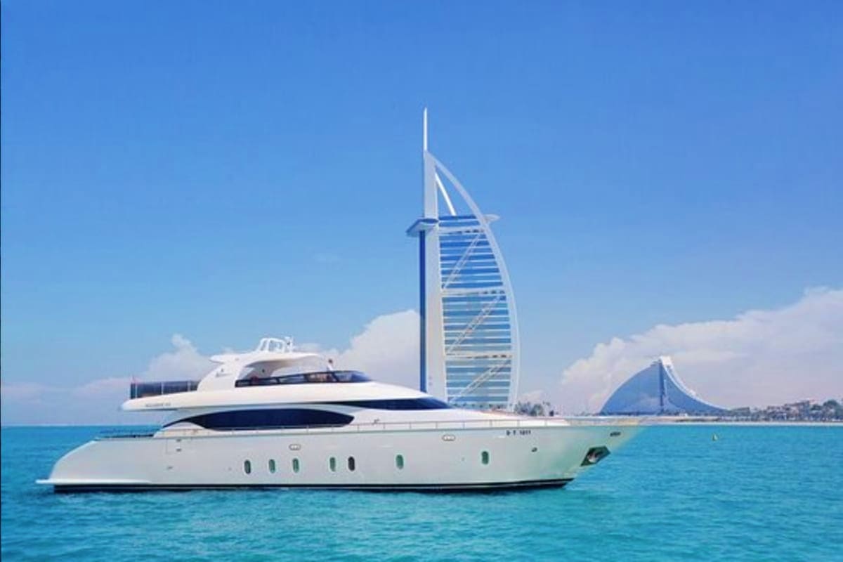 Luxury yacht moored in turquoise waters with Atlantis The Palm resort in the background, Dubai (5)