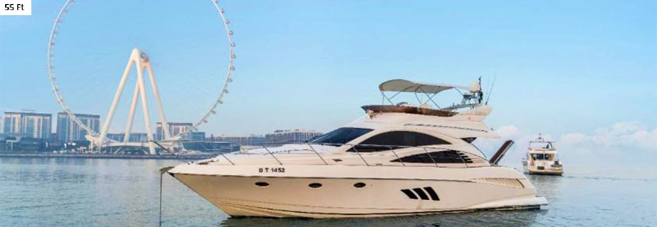 33-foot luxury yacht with passengers on turquoise ocean water, Dubai Marina skyscrapers in background (4)