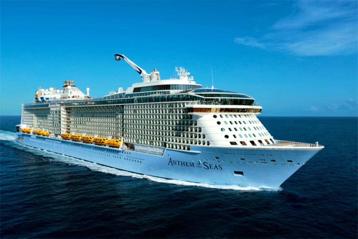 Anthem of the Seas cruise ship sailing on ocean waters under clear blue sky