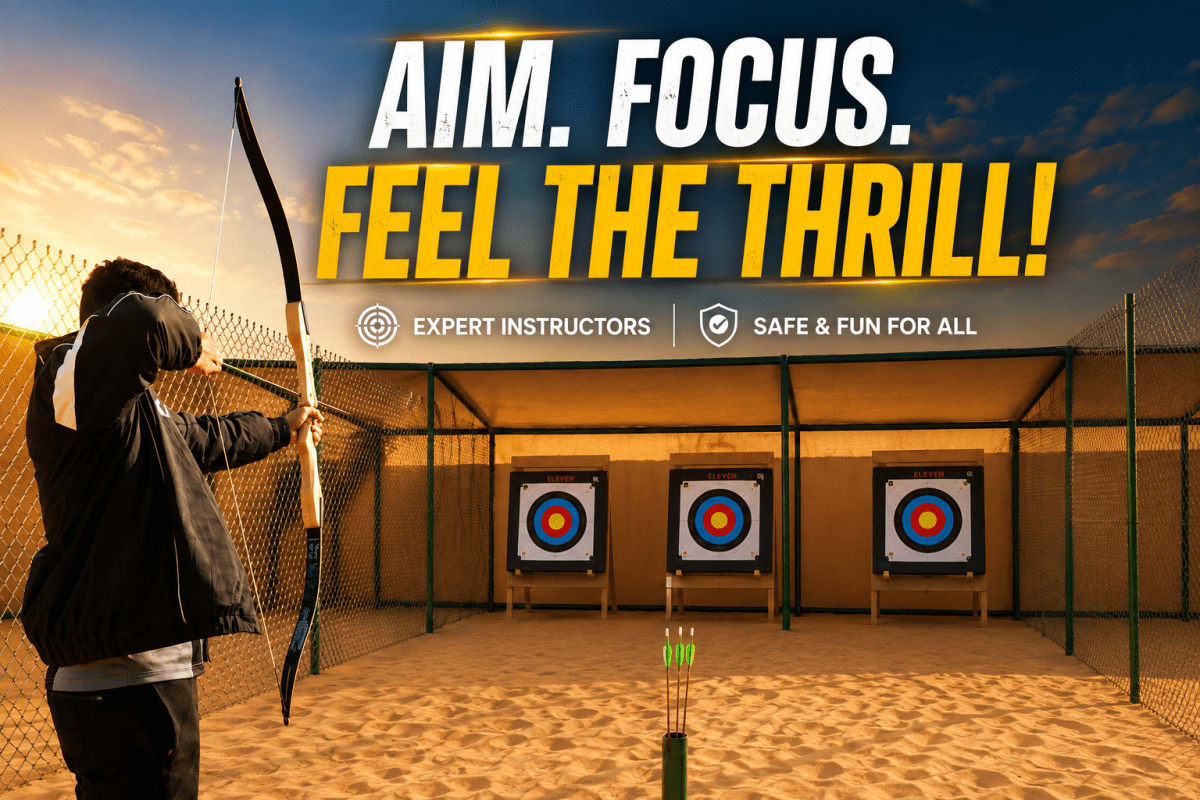 Archer with compound bow aiming at targets in sand arena with colorful bullseye targets and chain-link fence enclosure at sun