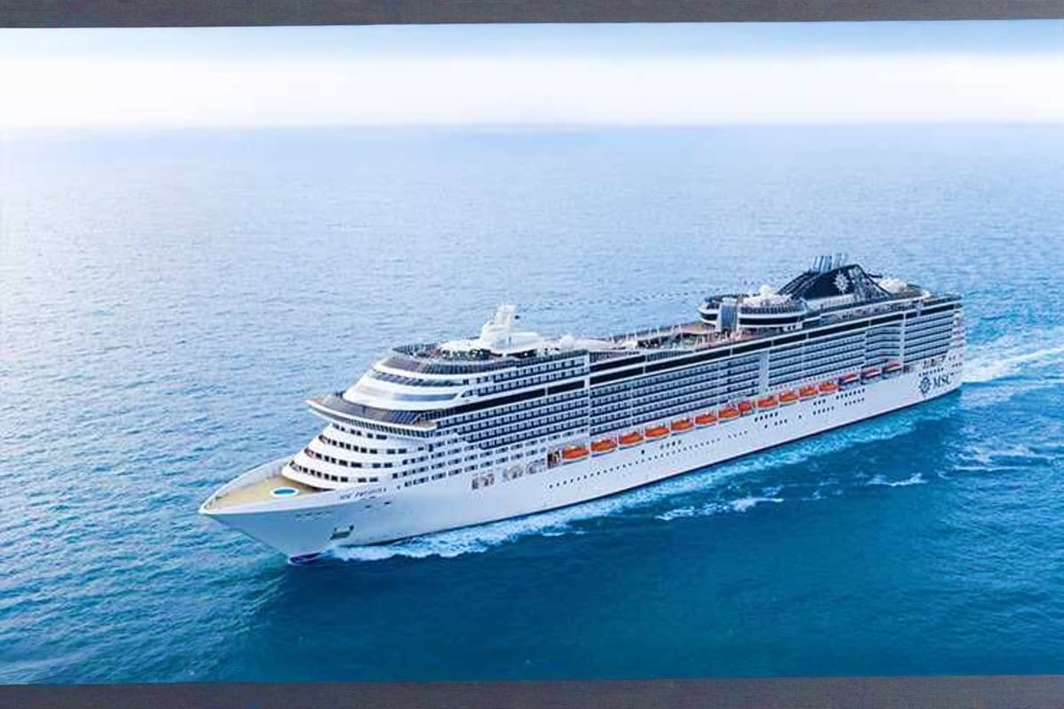 MSC Preziosa cruise ship sailing on blue ocean water under clear sky
