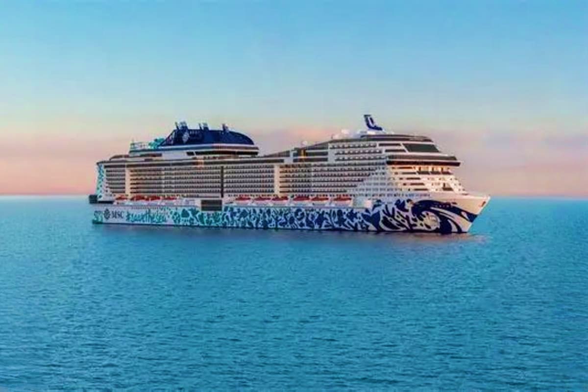 MSC Euribia cruise ship sailing on calm blue ocean water at sunset with clear sky