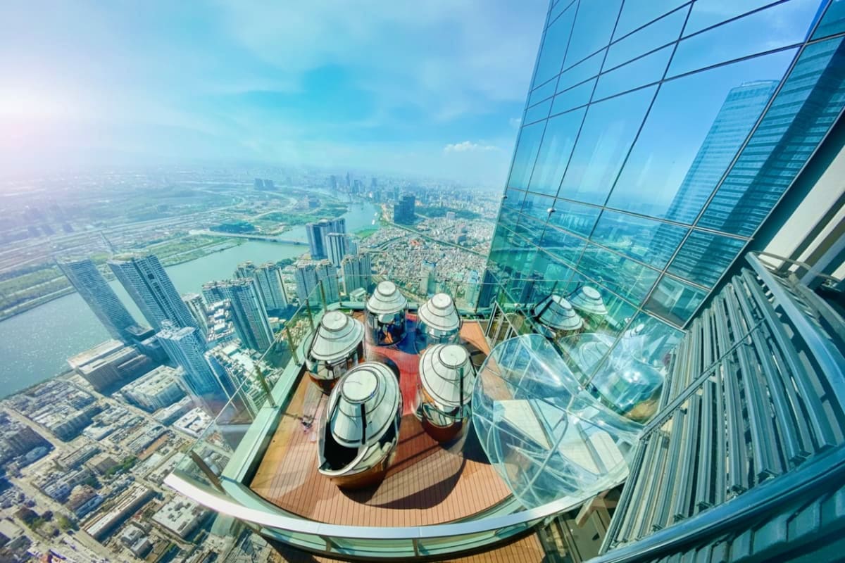 Outdoor observation deck at Landmark 81 with panoramic views of Ho Chi Minh City skyline and Saigon River below