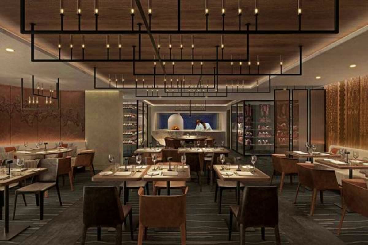 Modern luxury restaurant interior with wooden accents, geometric pendant lighting, and contemporary dining setup with open ki