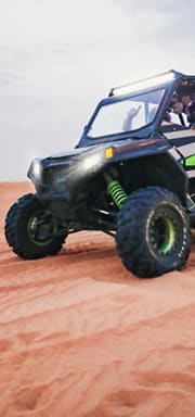 Off-road buggy driving in the desert