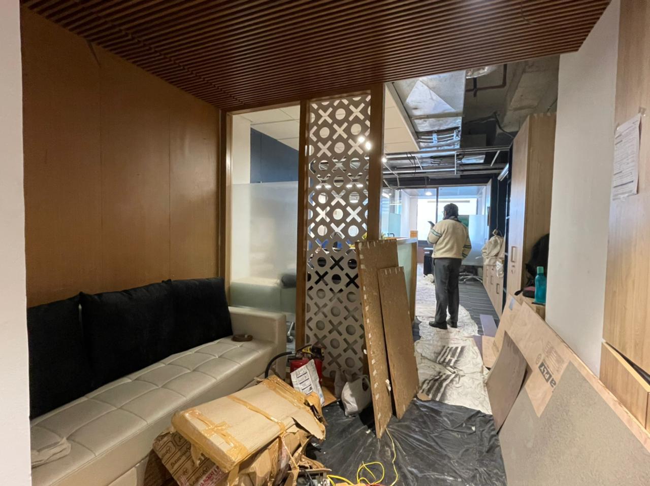 Knauf office entrance with wooden laminates and bamboo ceiling