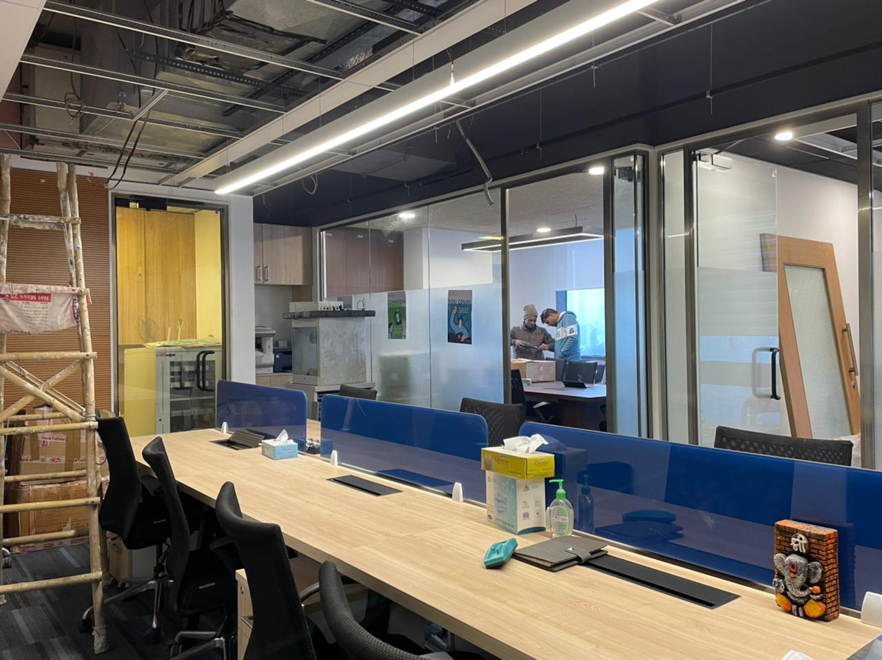 Glass partitions in Knauf office drawing daylight into work areas