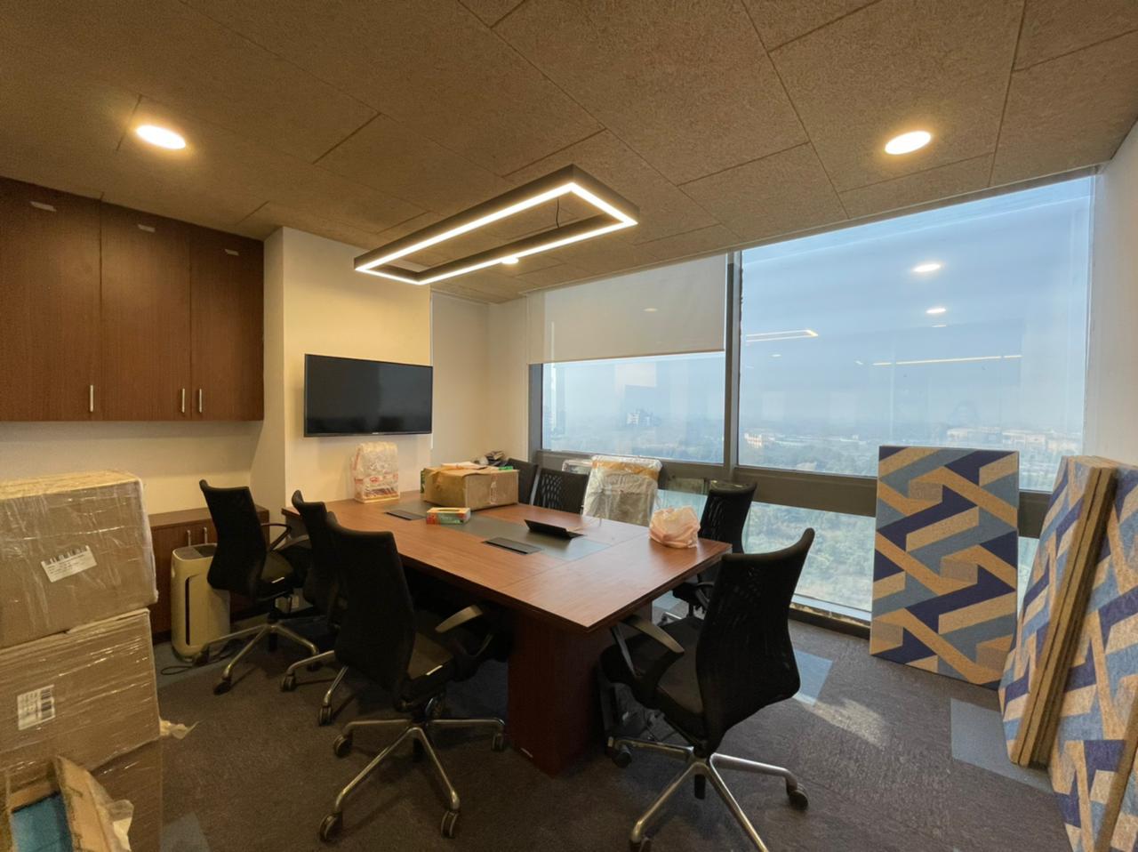 Knauf office meeting room with warm wood finishes and clean lines