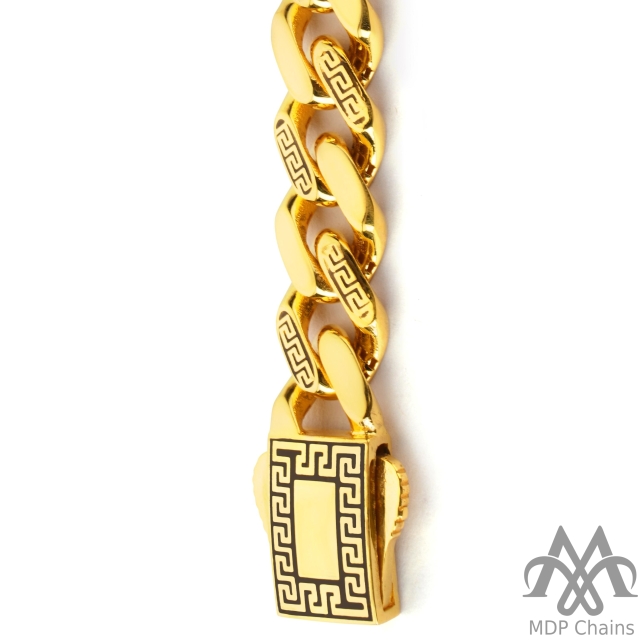 A beautiful 22kt gold Cuban B11 bracelet. This piece has a fancy pattern and a high polish finish. Style tags: designer, lobster.