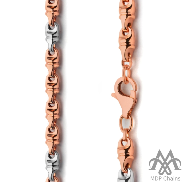 choco c5 - A round hollow chain with a indo choco pattern and fancy links. Finished with a beautiful two tone. A perfect example of fish hook and italian design.