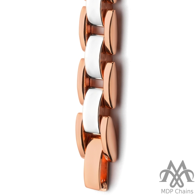 caterpillar - A flat hollow bracelet with a choco fusion pattern and fancy links. Finished with a beautiful two tone. A perfect example of uniform design.
