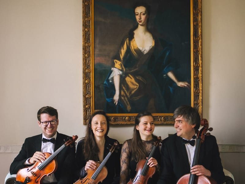 Aderyn String Quartet smiling together