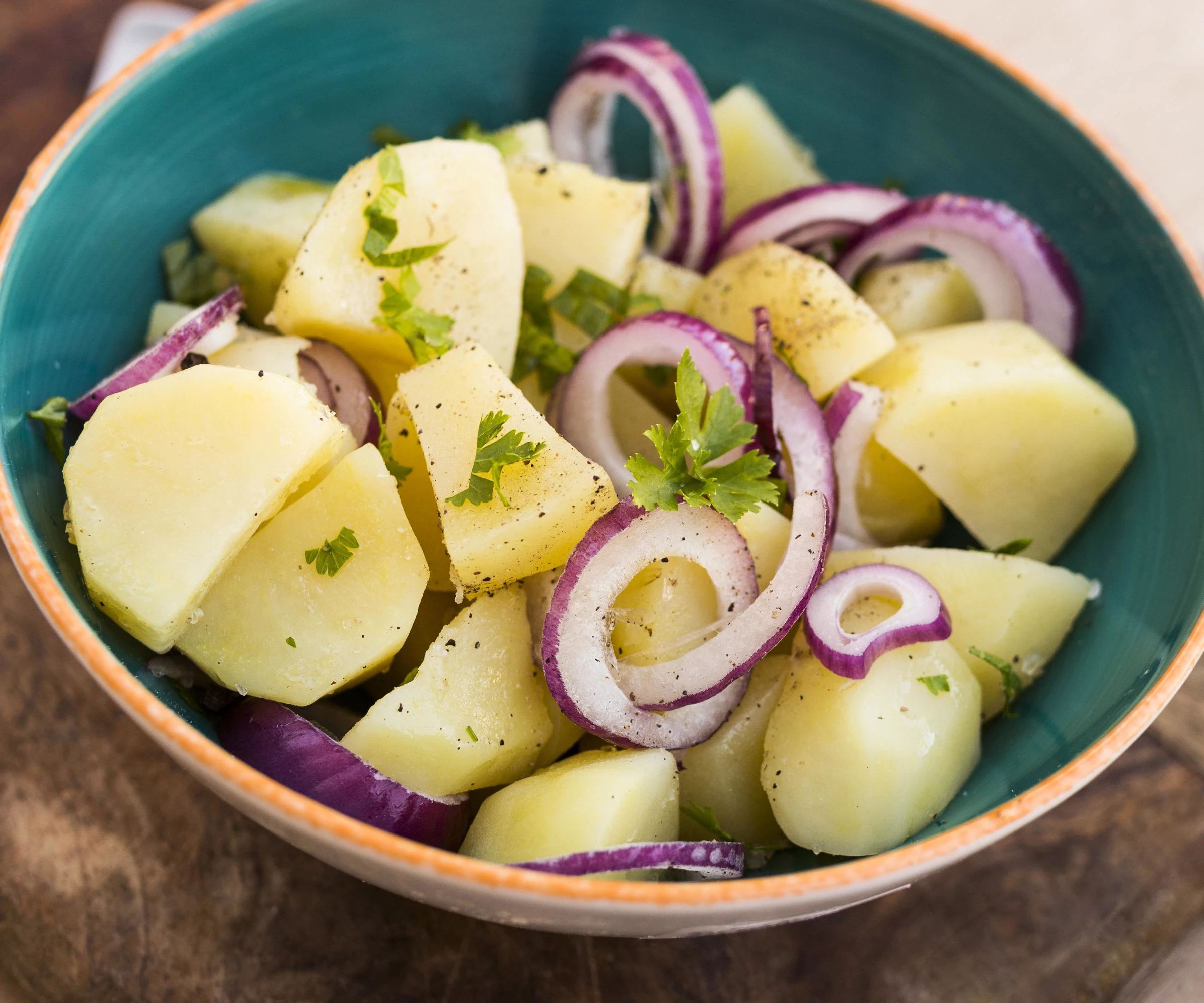 Women make a health meal cutting apples