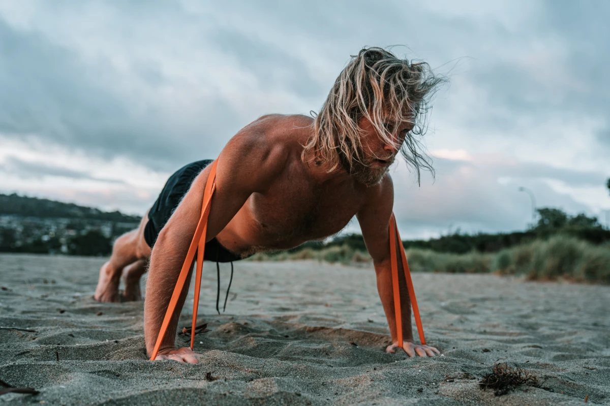 Andy Leigh doing Push ups with resistance band