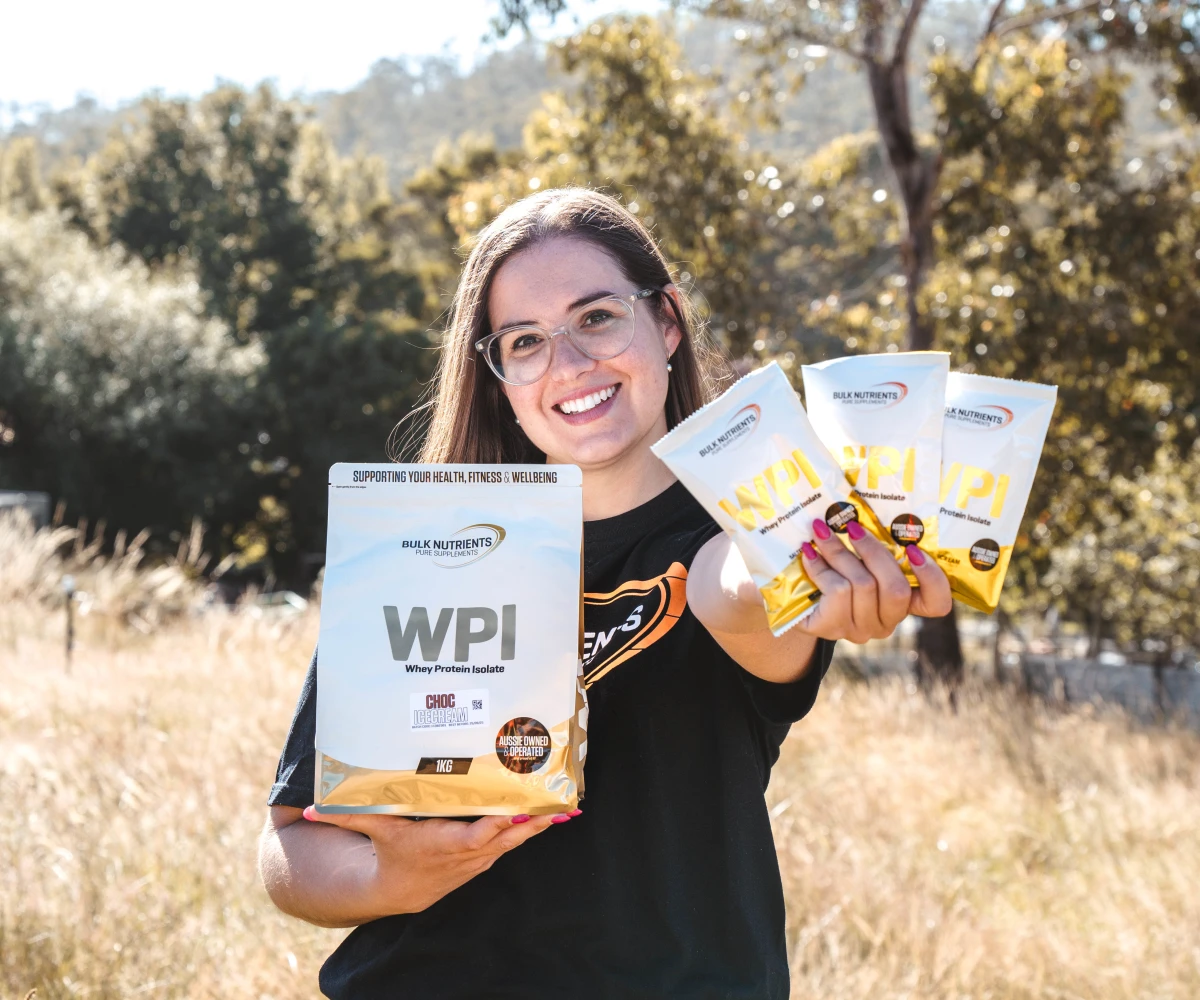 Chelsea holding a bag of WPI and some WPI samples