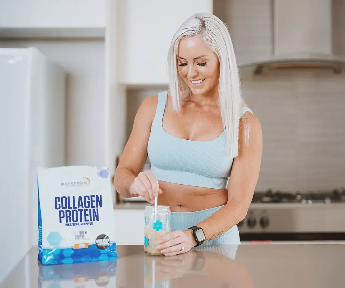 Tarran Lee mixing her Bulk Nutrients Collagen Protein on the kitchen counter