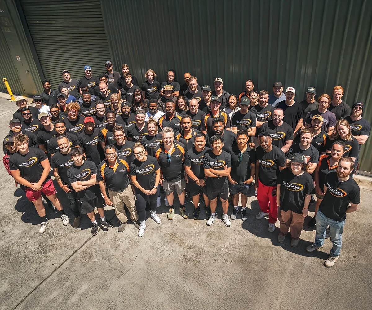 Bulk Nutrients Staff standing in from of the green shed