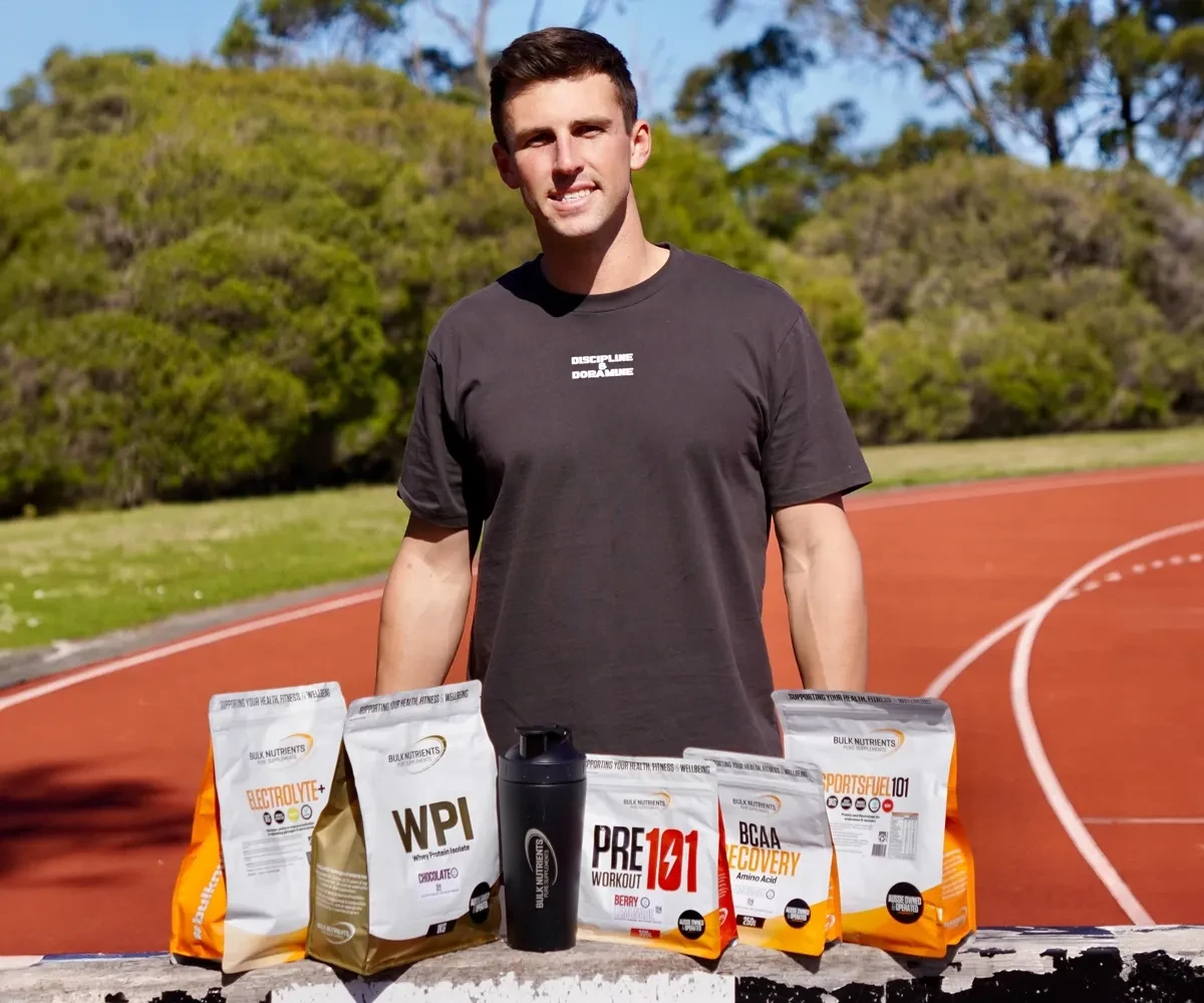 Ambassador Jacob Despard with Bulks' HASTA range including HASTA Whey Protein Isolate