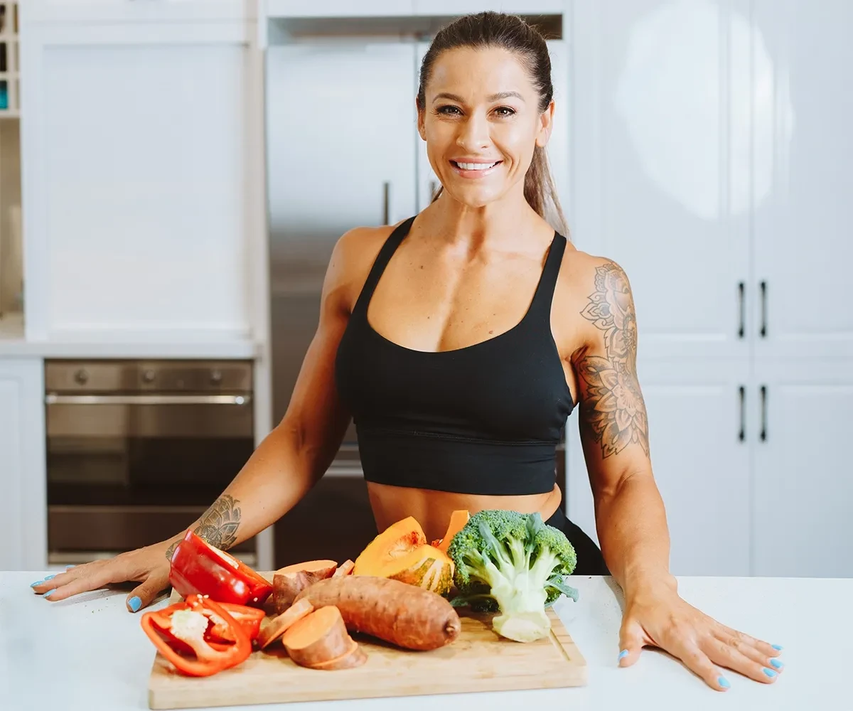 Tammie Sarkozy with vegetables on a table