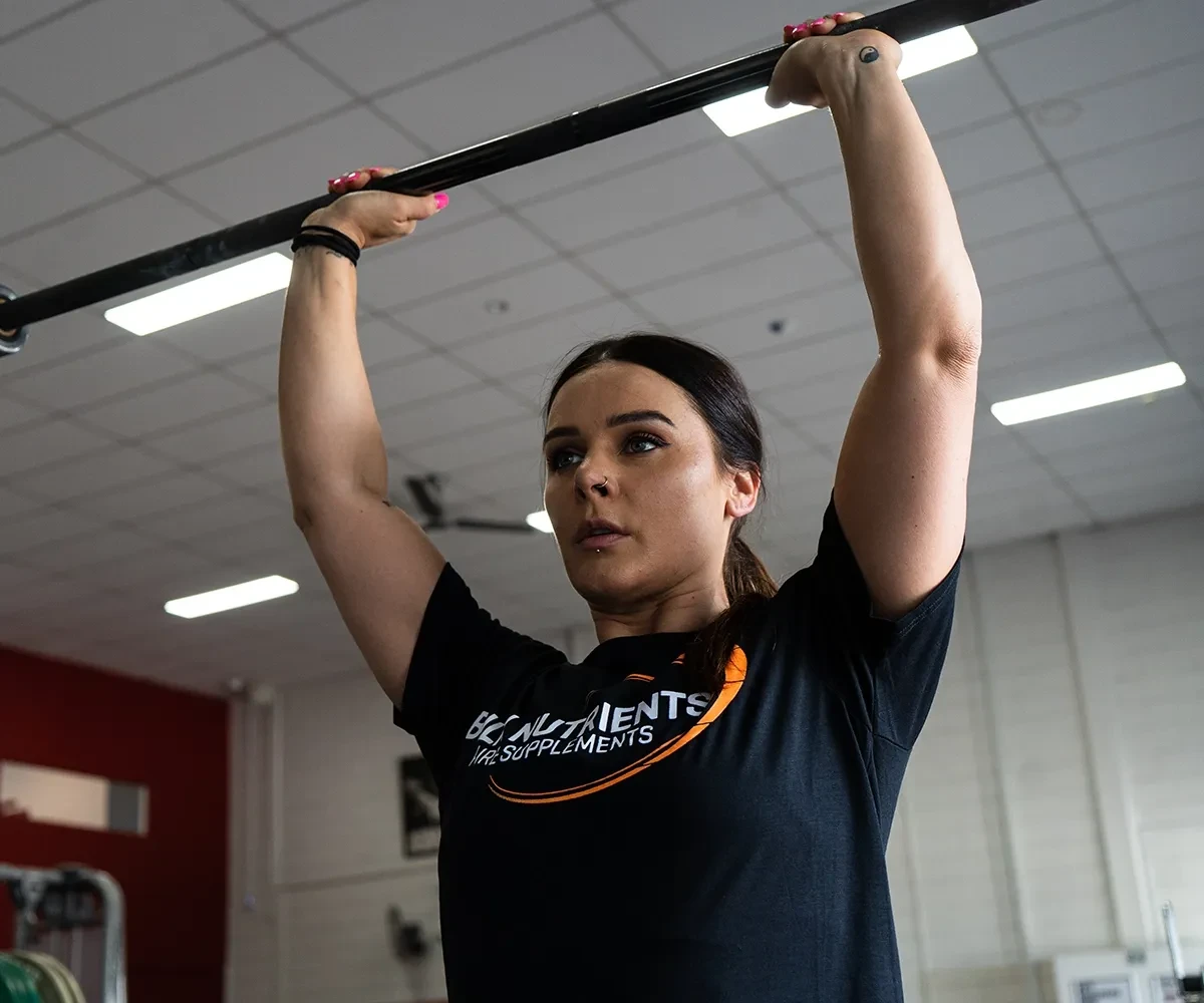 Bulk Nutrients Ambassador Ellena Tsatsos lifting a bar above her head