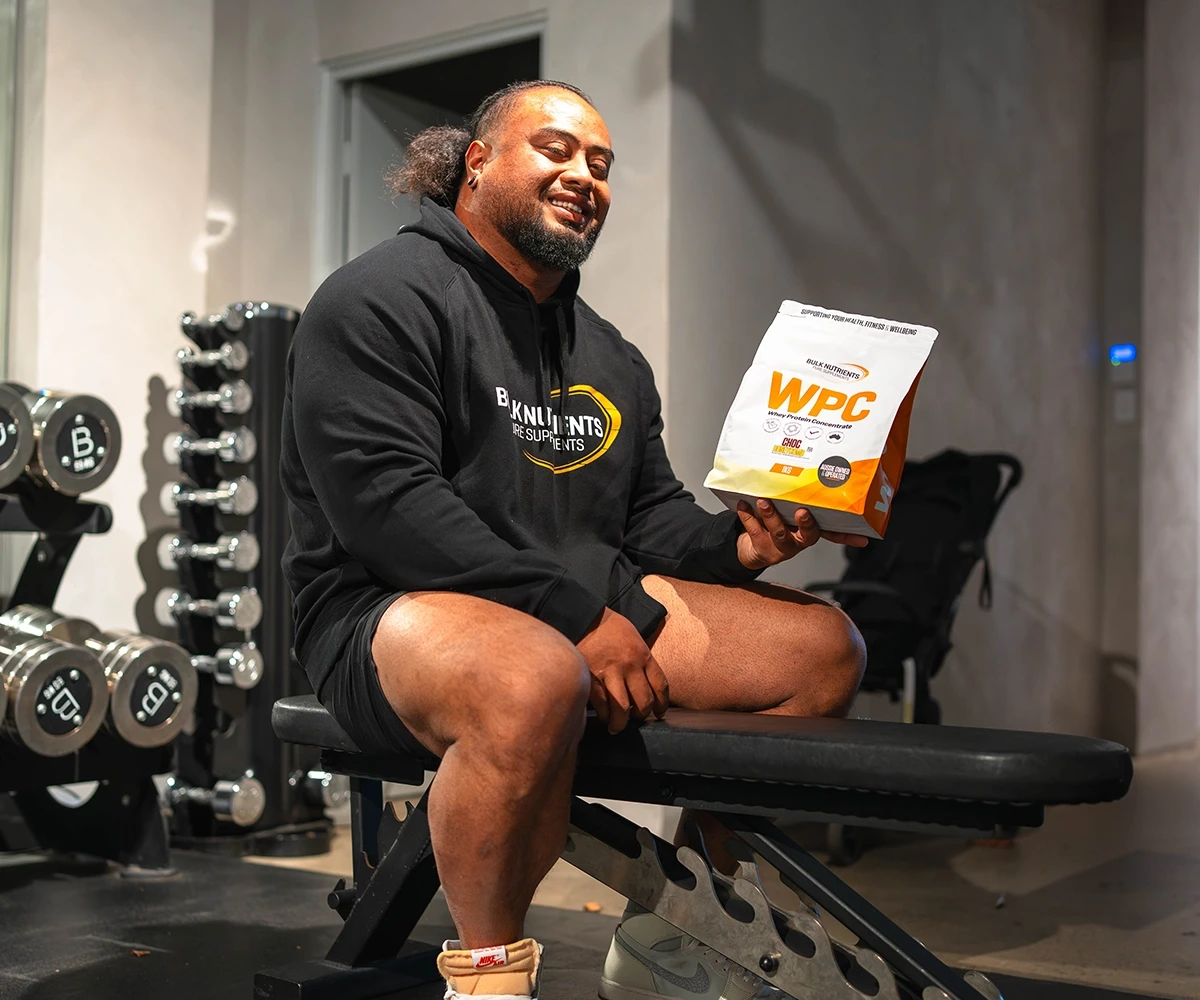 Bulk Nutrients - Blog - Ambassador - Vasa Samataua with a bag of WPC