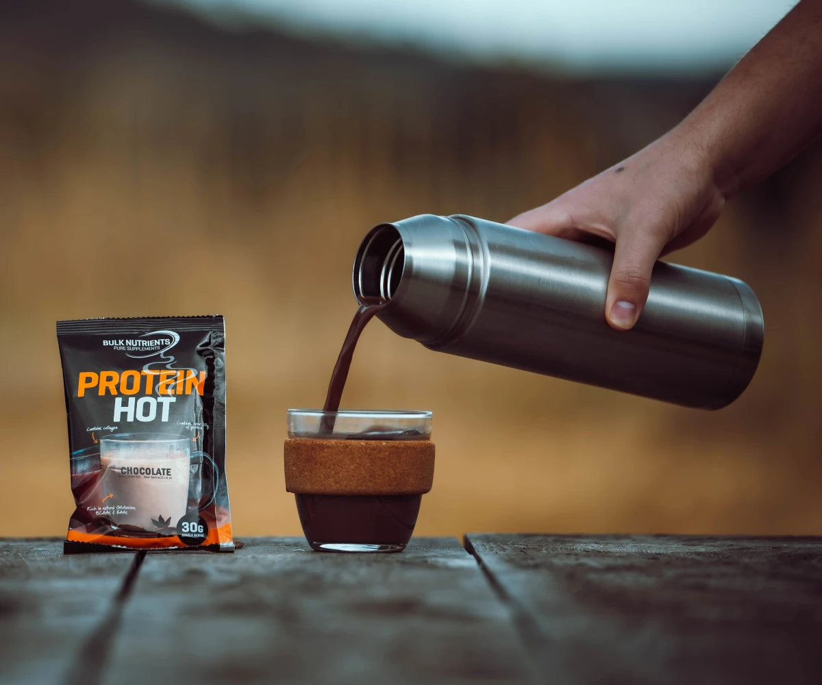 Protein Hot Chocolate being poured into a cup