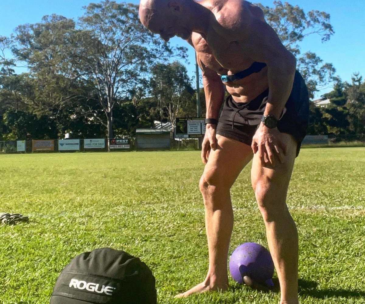 Bulk Nutrients Ambassador Bobby Dee doing a kettlebell and medicine ball workout