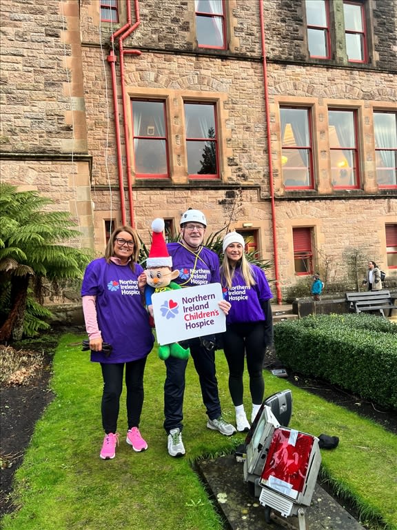 JMD team completing NI Hospice Abseil 