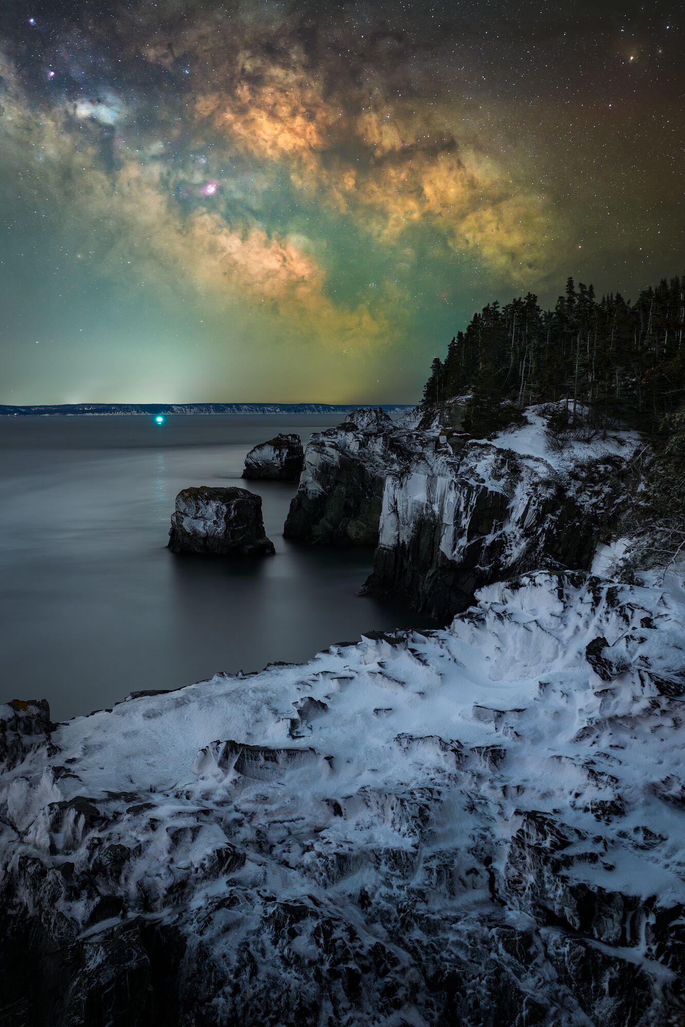 Milky Way Over Snow Covered Cliffs