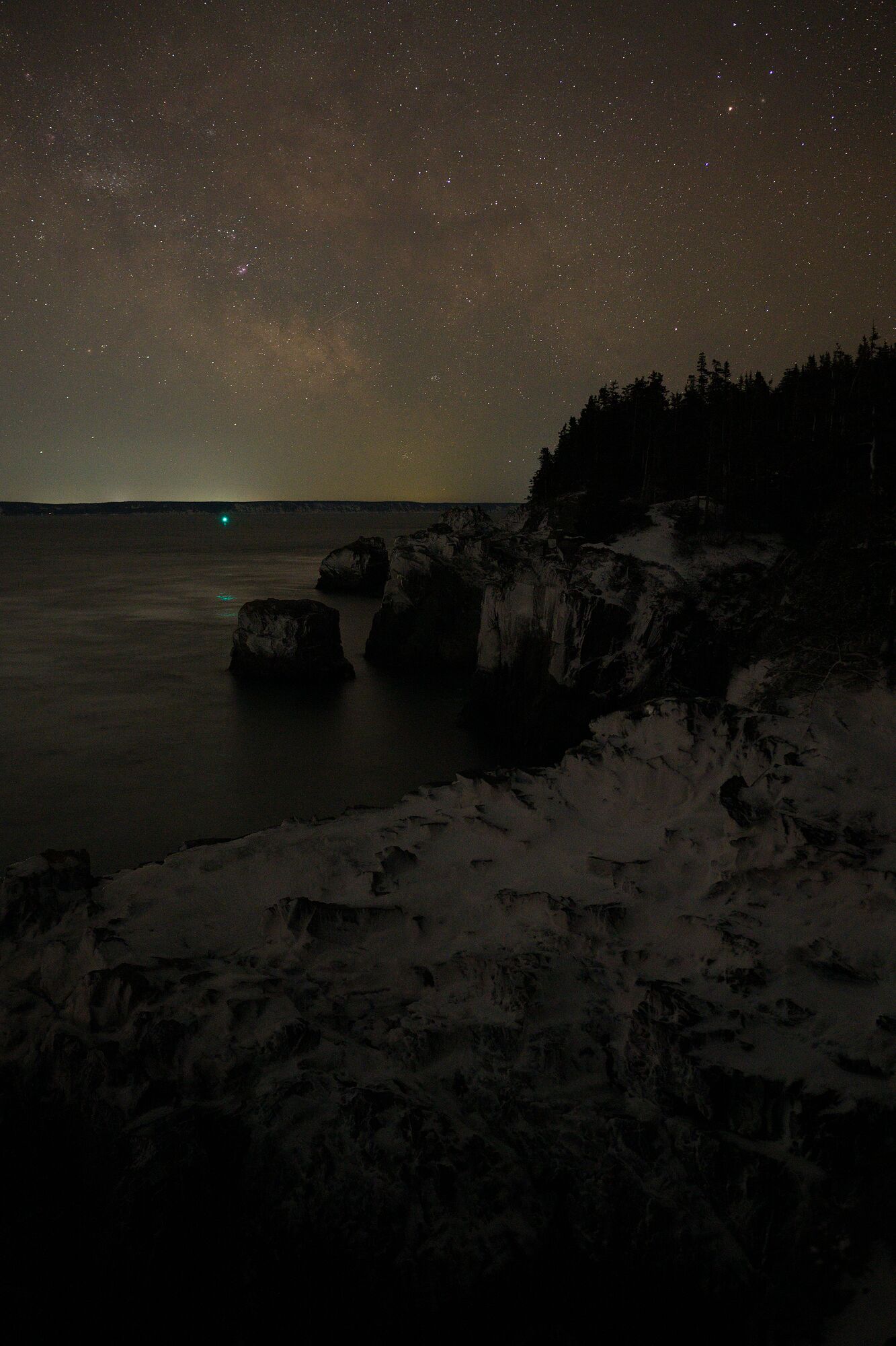 Milky Way Over Snow Covered Cliffs - unedited raw file