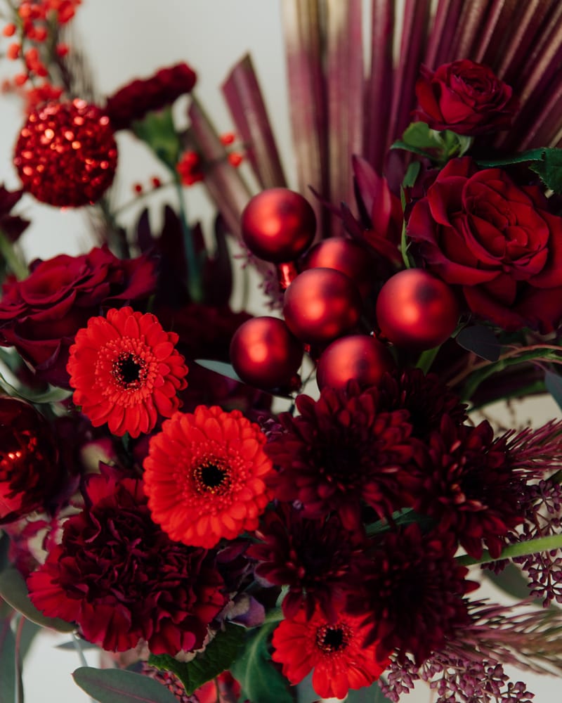 Close up of all red arrangement featuring red bobbles