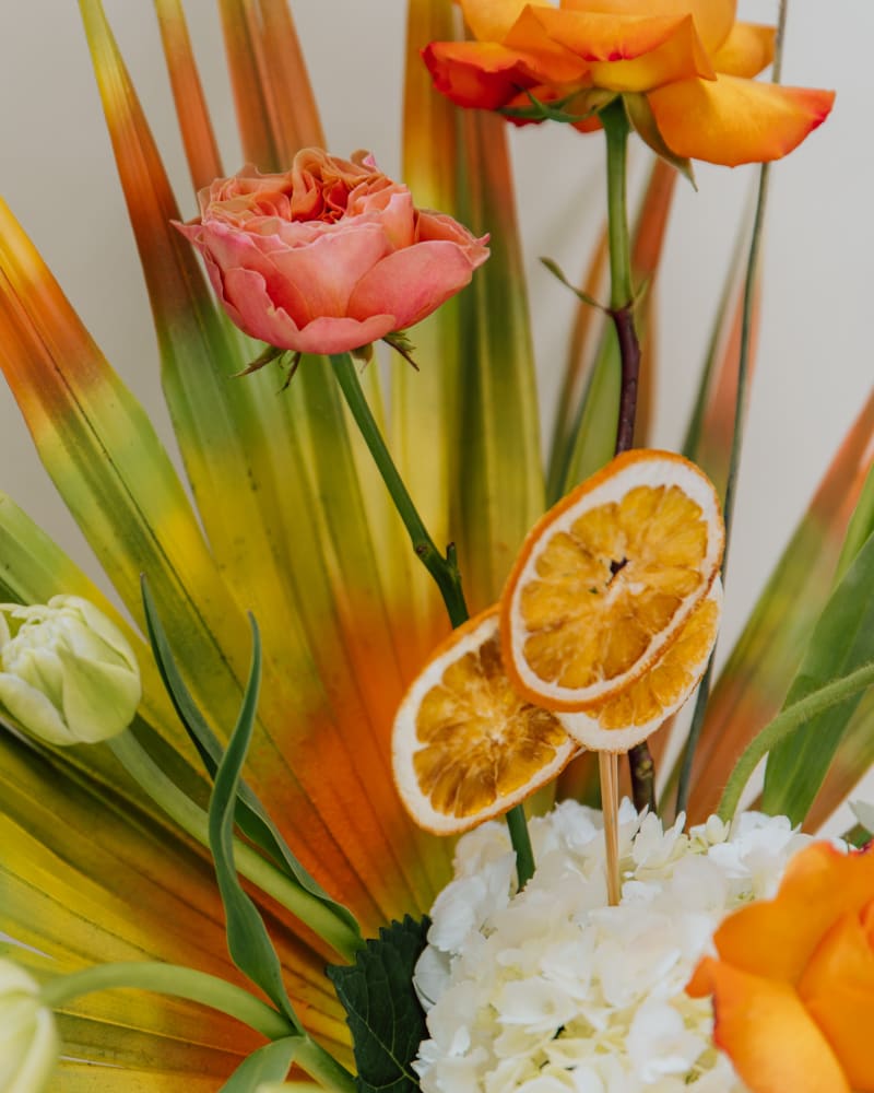 Citrus Burst orange slices and spray painted palm