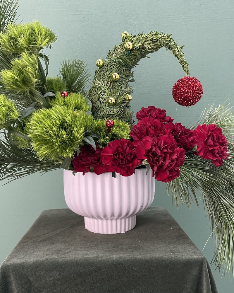 "Grinch, but make it fashion" arrangement