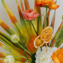 Citrus Burst orange slices and spray painted palm