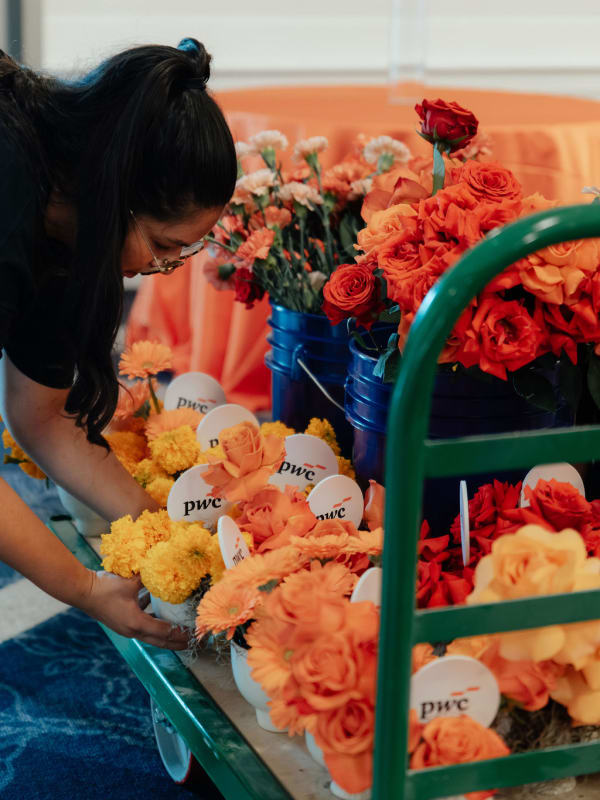 Large-scale floral installation at a conference gala