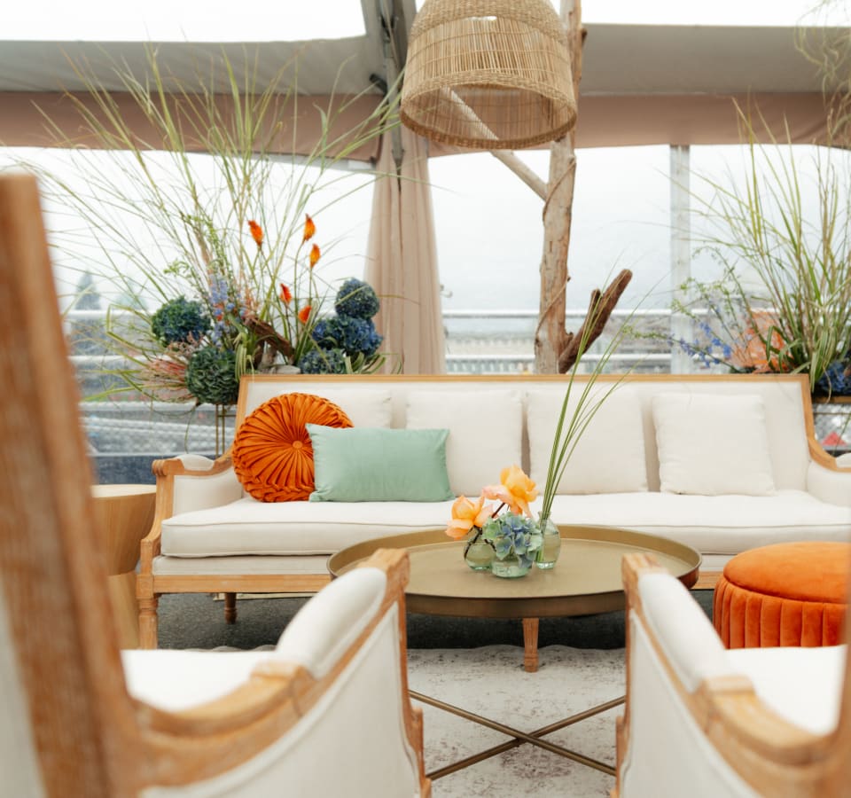 A dramatic floral installation at a conference gala