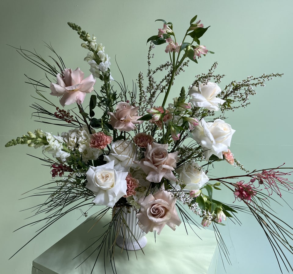 A soft, elegant sympathy arrangement
