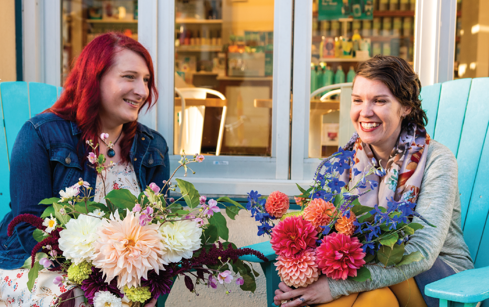 Amy and Marcy, a trans couple with dahlia bouquets