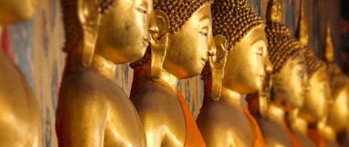 Golden Buddha Statues at Wat Arun in Bangkok, Thailand