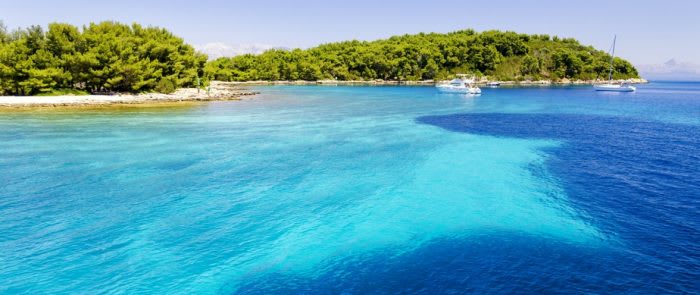 clear crystal water over Hvar island in Dalmatia, Croatia