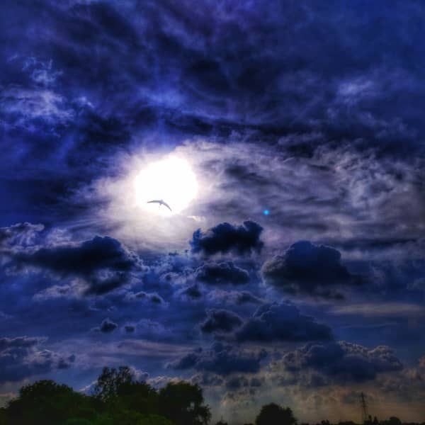 Dramatic Sky with Sun and Clouds