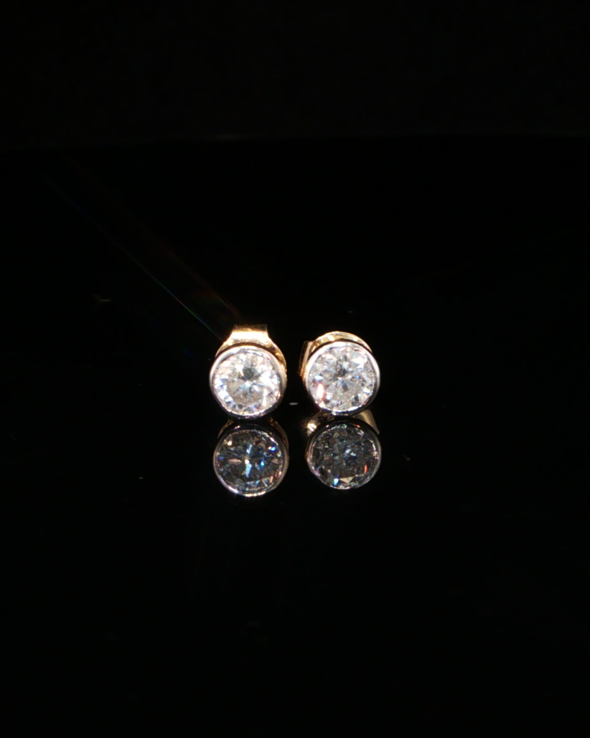 0.87 CTW Round Brilliant Cut Lab-Grown Diamond Bezel Stud Earrings in 14K Yellow Gold, view 3