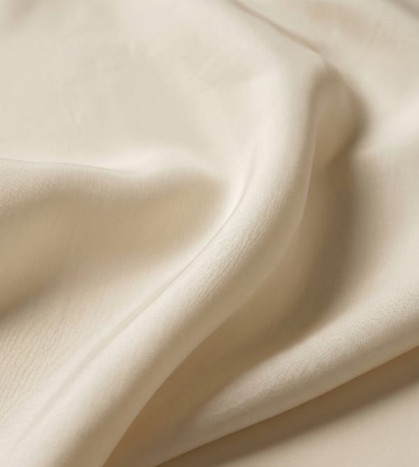 What momme weight means in silk — and how to judge quality before you buy