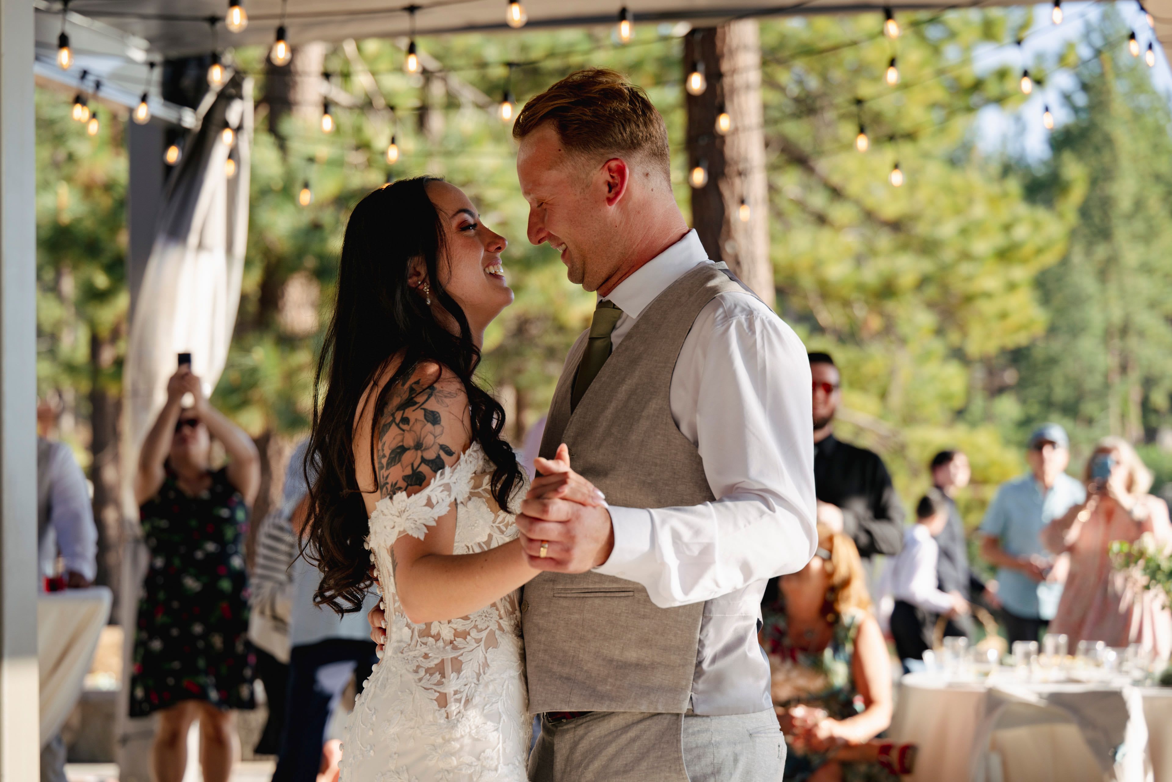 wedding couple dancing on the edge of Lake Tahoe